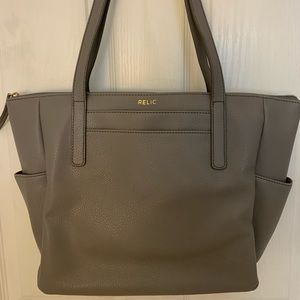 Relic tote purse. Many pockets, inside and outside.